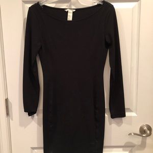 Black form fitting long sleeve classic dress